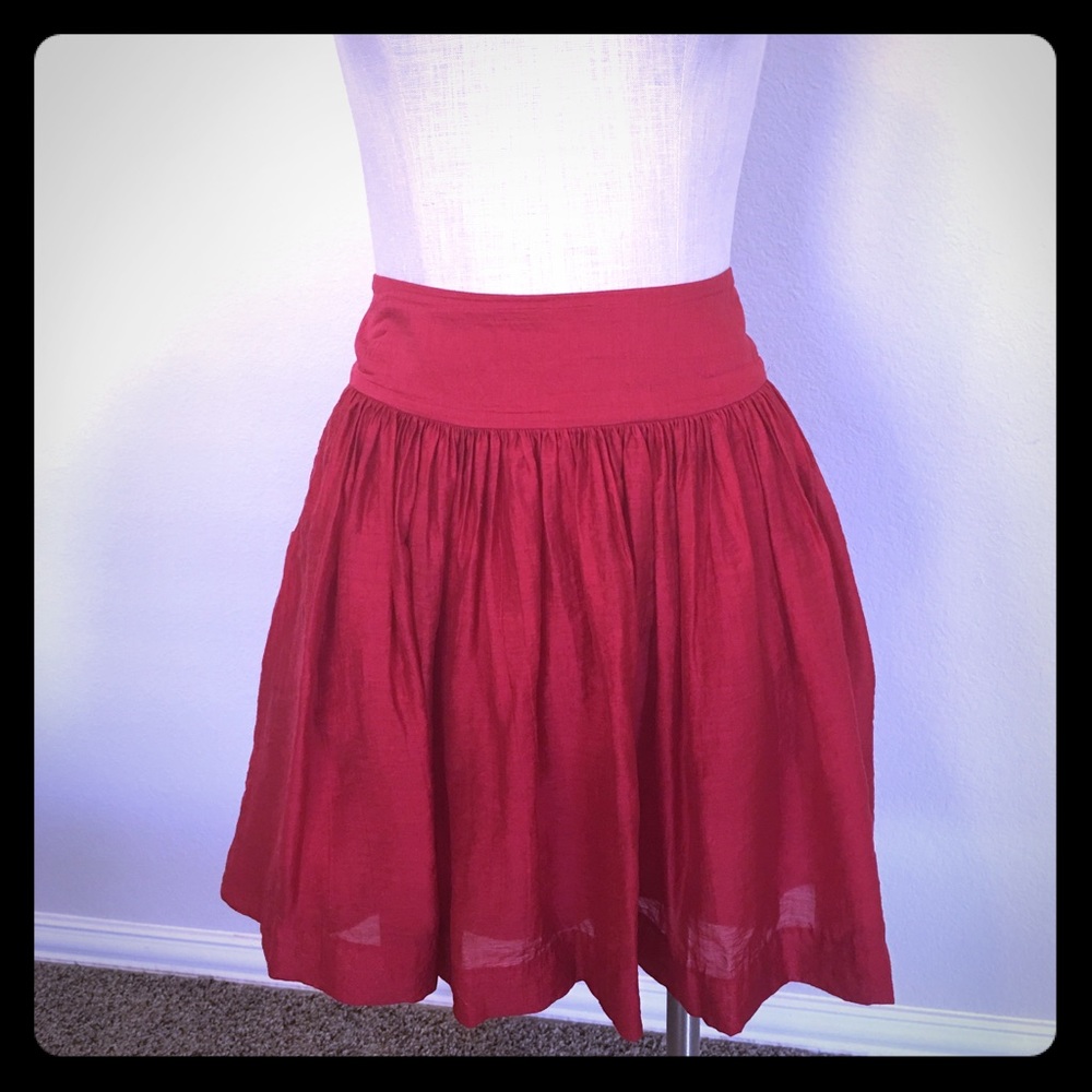 Red mini skirt with pockets